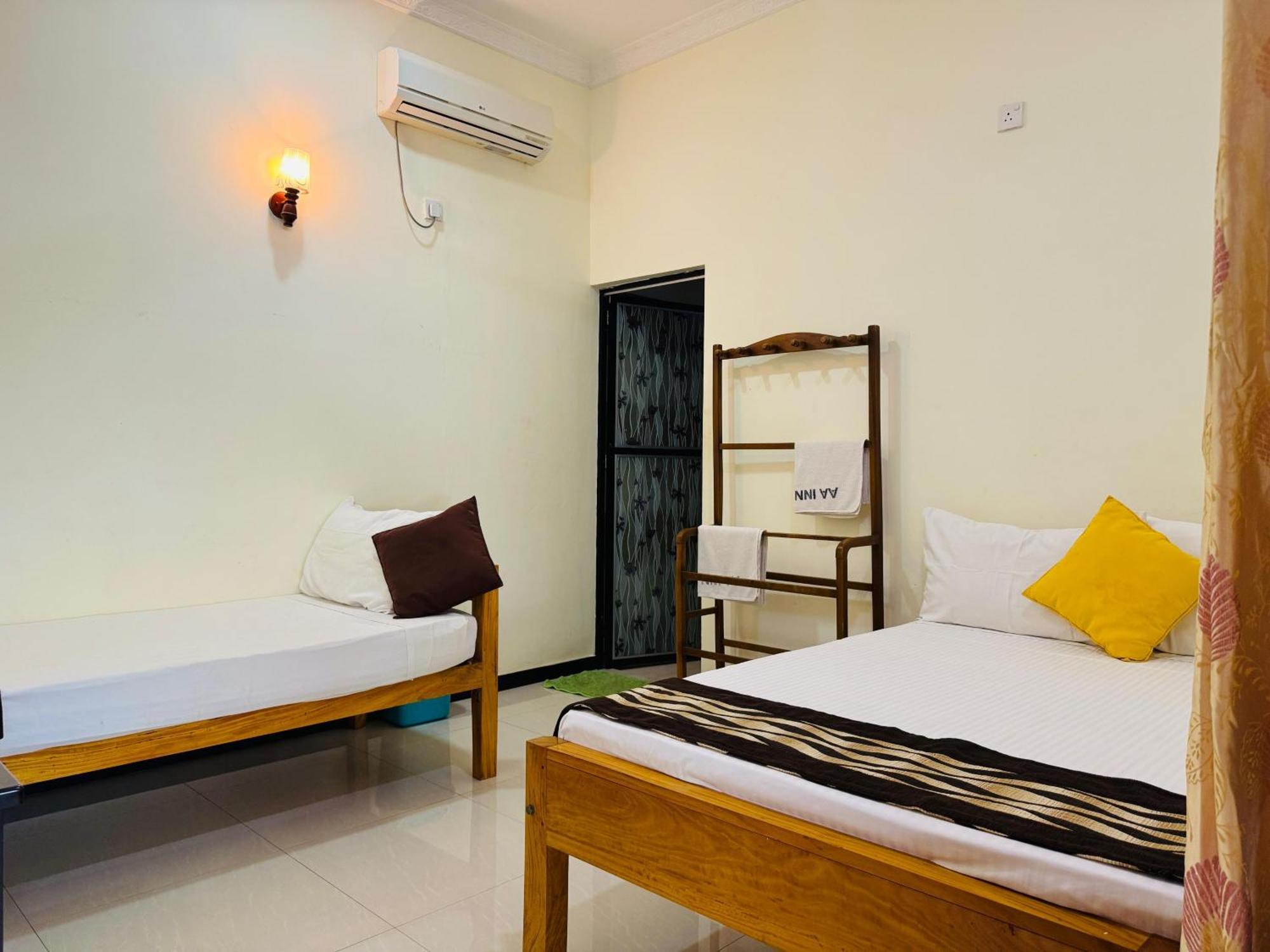 Aa Inn تريكونامالاي الغرفة الصورة